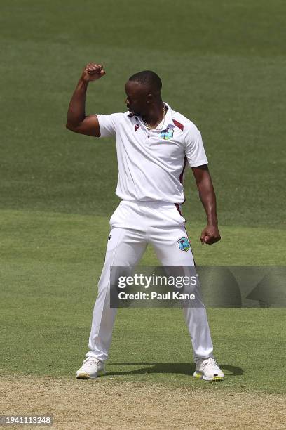 Kemar Roach of the West Indies celebrates the wicket of Mitch Marsh of Australia during day two of the First Test in the Mens Test match series...