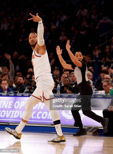 Jalen Brunson of the New York Knicks reacts after making a three-point shot during the first half against the Houston Rockets at Madison Square...