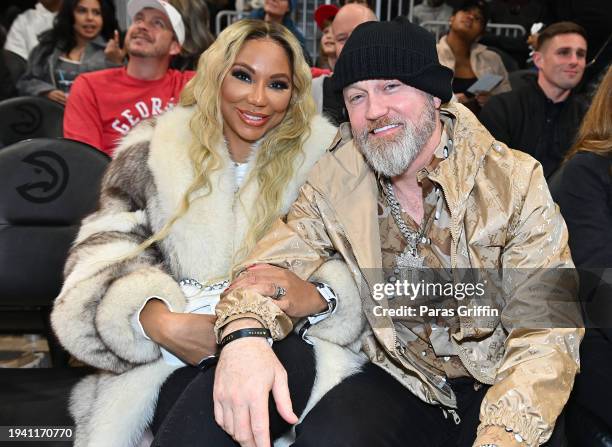 Tamar Braxton and Jeremy "JR" Robinson attend the game between Orlando Magic and the Atlanta Hawks at State Farm Arena on January 17, 2024 in...