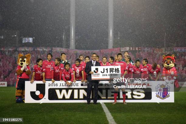 Captain Yoichiro Kakitani of Cerezo Osaka is presented the J.League J1 Promotion board from J.League Chairman Mitsuru Murai at the award ceremony...