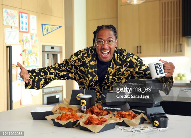 In this image released on January 18, Nick Cannon gets saucy on the set of his Buffalo Wild Wings ad shoot in Los Angeles, California.