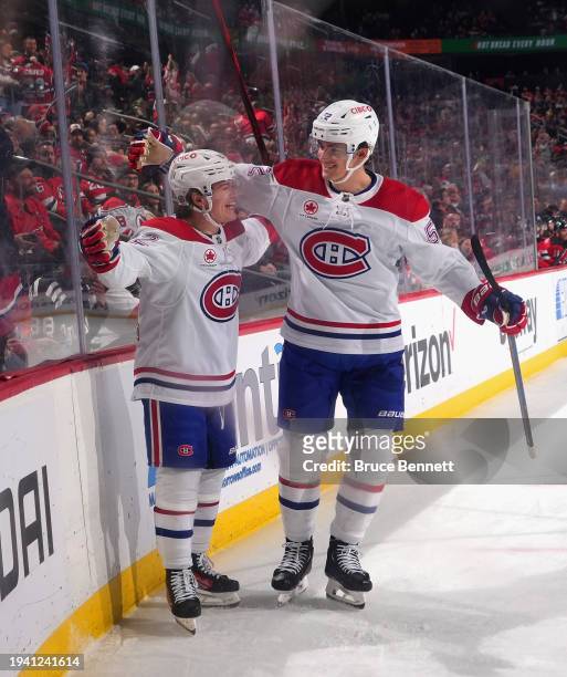 Cole Caufield of the Montreal Canadiens celebrates his game-winning goal at 15:29 of the third period against the New Jersey Devils at Prudential...