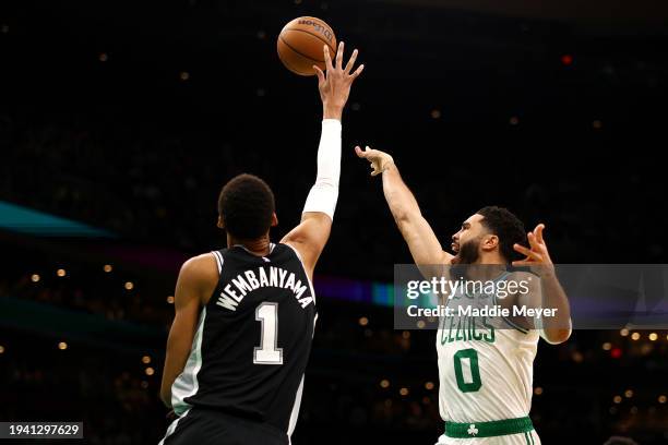 Victor Wembanyama of the San Antonio Spurs blocks a shot from Jayson Tatum of the Boston Celtics at TD Garden on January 17, 2024 in Boston,...