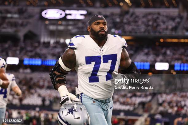 Tyron Smith of the Dallas Cowboys warms up prior to an NFL wild-card playoff football game against the Green Bay Packers at AT&T Stadium on January...