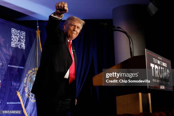 Republican presidential candidate and former U.S. President Donald Trump talks to supporters during a campaign rally at the Sheraton Portsmouth...