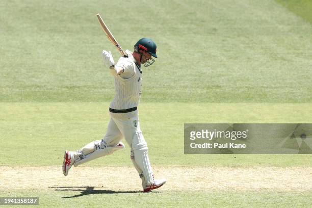 Travis Head of Australia celebrates his century during day two of the First Test in the Mens Test match series between Australia and West Indies at...