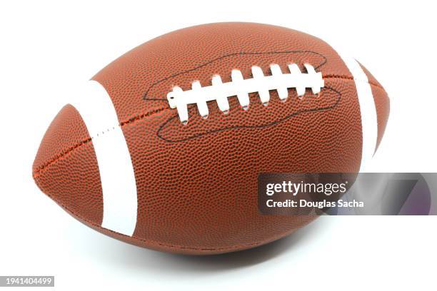 pro football game ball - ballon de football américain photos et images de collection