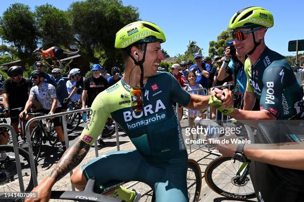 Stage winner Sam Welsford of Australia and Ryan Mullen of Ireland and Team BORA - Hansgrohe react after the 24th Santos Tour Down Under 2024, Stage 3...