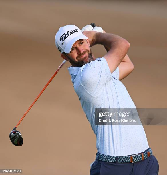 Scott Jamieson of Scotland plays his second shot on the third hole during Round One of the Hero Dubai Desert Classic at Emirates Golf Club on January...