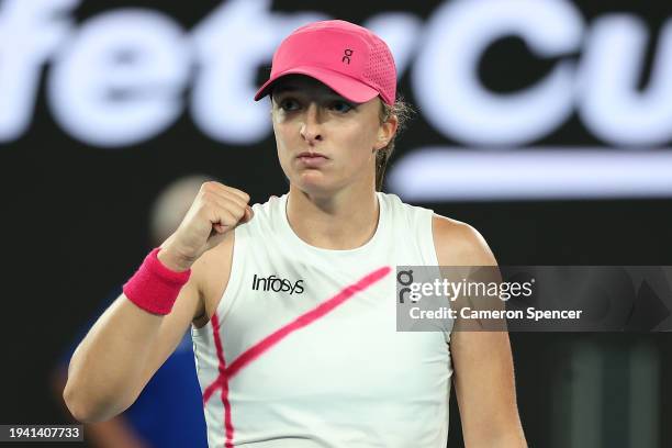 Iga Swiatek of Poland reacts after winning their round two singles match against Danielle Collins of the United States during the 2024 Australian...