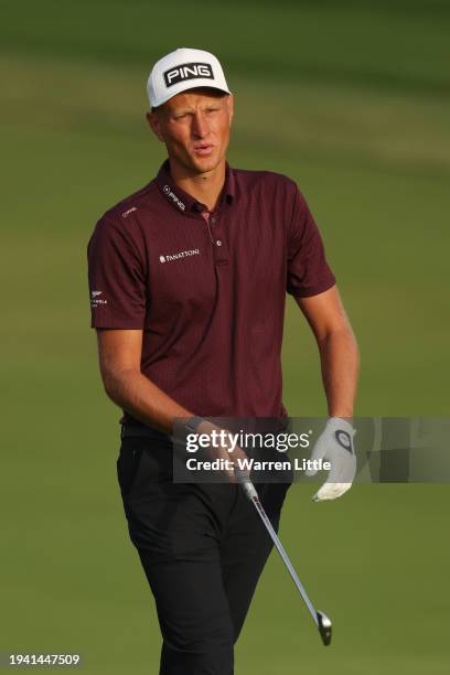 Adrian Meronk of Poland reacts on the 10th hole during Round One of the Hero Dubai Desert Classic at Emirates Golf Club on January 18, 2024 in Dubai,...