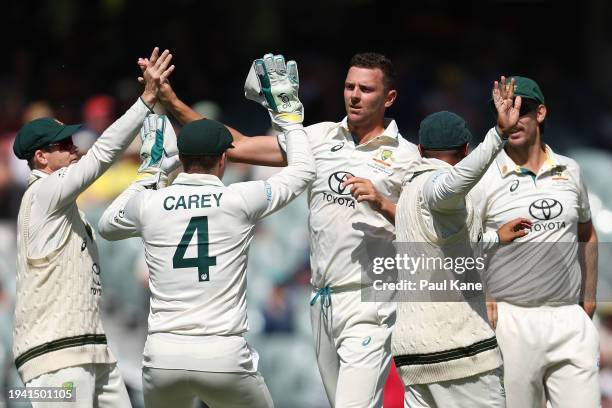 Josh Hazlewood of Australia celebrates the wicket of Alick Athanaze of the West Indies during day two of the First Test in the Mens Test match series...