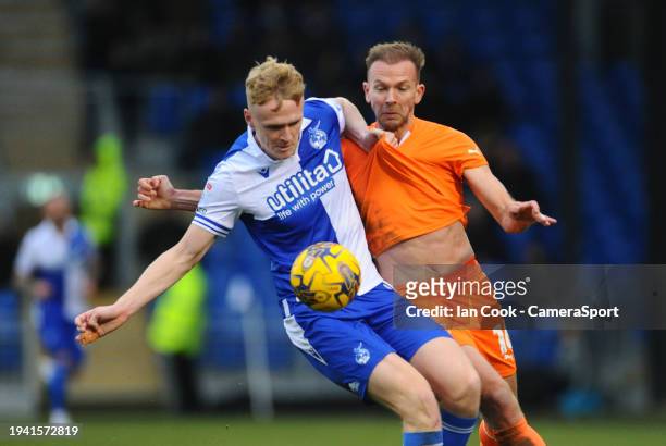 Bristol Rovers Connor Taylor battles with Blackpool's Jordan Rhodes during the Sky Bet League One match between Bristol Rovers and Blackpool at...