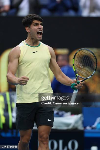 Carlos Alcaraz of Spain celebrates match point in their round two singles match against Lorenzo Sonego of Italy during the 2024 Australian Open at...
