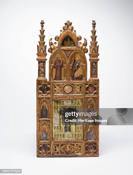 Wing of a Reliquary Diptych with the Crucifixion and Saints, circa 1355-1370. This work, perhaps the right wing of a diptych , is one of only two...