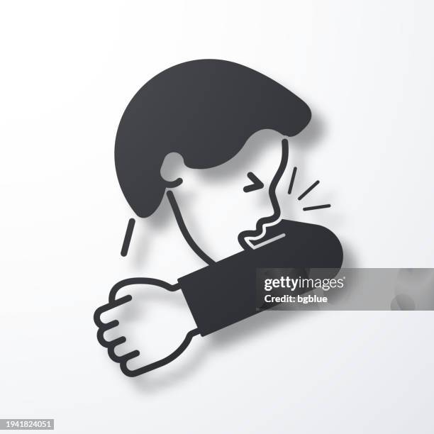 cough or sneeze into elbow. icon with shadow on white background - sneezing stock illustrations