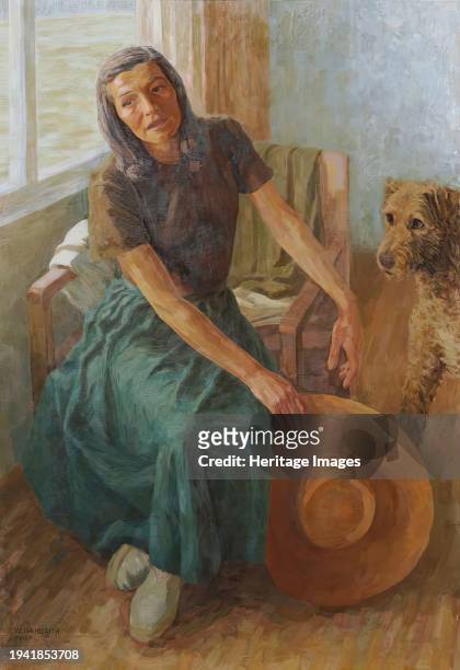 Grete Gamerith with dog "Puck", 1947. Margarethe at an open window. Creator: Walther Gamerith.