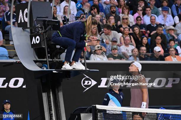 Holger Rune of Denmark speaks to Marijana Veljovic in his round two singles match against Arthur Cazaux of France during the 2024 Australian Open at...