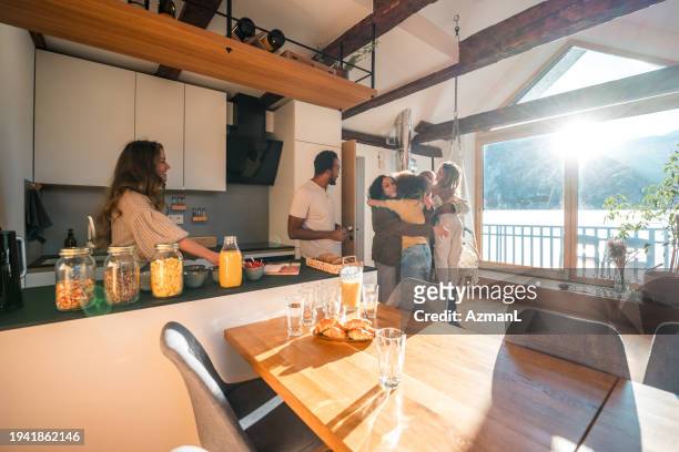 diverse family gathering in kitchen with grandparents and children - family and happiness and diverse imagens e fotografias de stock