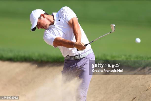 Rory McIlroy of Northern Ireland plays his second shot on the ninth hole during Round One of the Hero Dubai Desert Classic at Emirates Golf Club on...