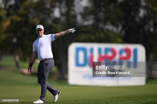 Daffue of South Africa reacts after his second shot on the 18th hole on day one of the Hero Dubai Desert Classic at Emirates Golf Club on January 18,...