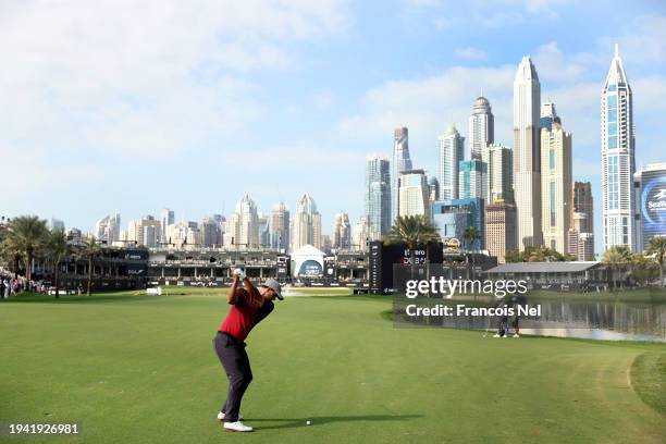 Adam Scott of Australia plays his second shot on the 18th hole during day one of the Hero Dubai Desert Classic at Emirates Golf Club on January 18,...