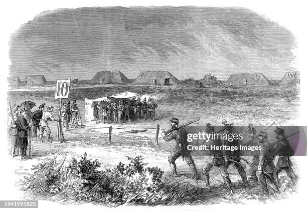 National Rifle Association meeting at Wimbledon: firing at the 200 yards range on Thursday week, 1861. 'Almost every corps in the kingdom was...