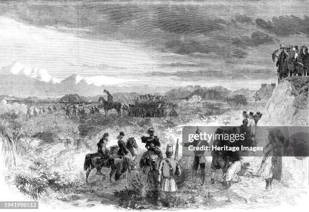 The National Rifle Association meeting on Wimbledon Common: skirmishers forming squares to resist cavalry, 1861. Military review in London. 'A...