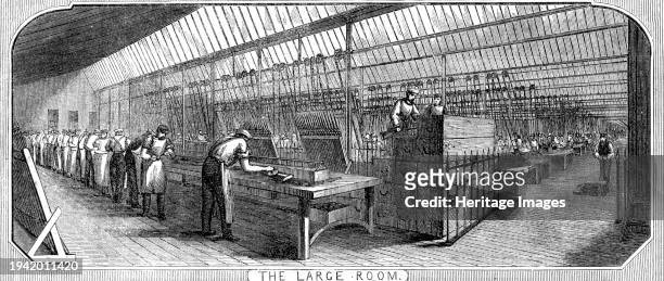 Royal Small Arms Factory, Enfield: The Large Room, 1861. The RSAF was a UK government-owned rifle factory produced British military rifles, muskets...