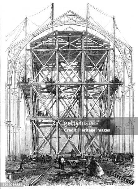 Progress of the Great Exhibition building: the traversing platform used in the construction of the nave, 1861. '...the most astonishing and the most...