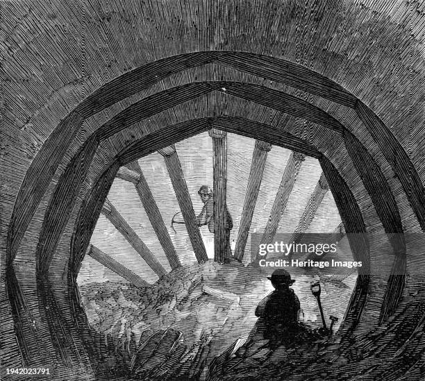 Driving a tunnel at Peckham, 1861. Illustration of '...the manner in which the sewer is carried forward by tunneling instead of opening a...