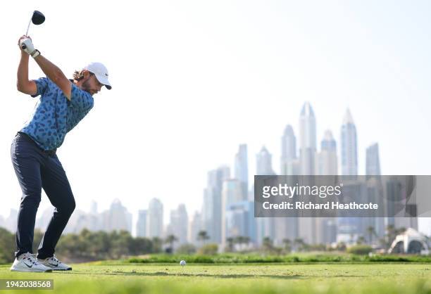 Tommy Fleetwood of England tees off on the eighth hole during Round One of the Hero Dubai Desert Classic at Emirates Golf Club on January 18, 2024 in...