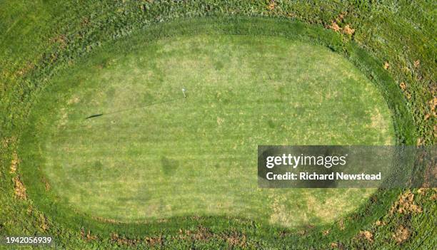 putting green - golf flag stock pictures, royalty-free photos & images