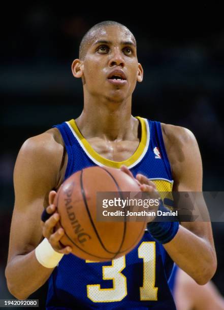 Reggie Miller, Shooting Guard for the Indiana Pacers prepares to make a free throw shot during the NBA Midwest Division basketball game against the...