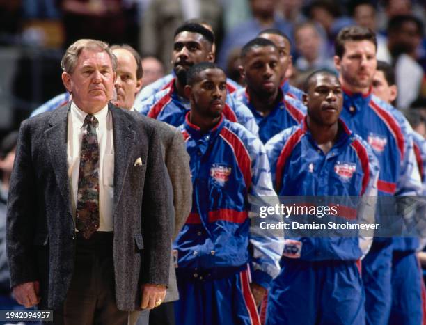 Bill Fitch , Head Coach for the New Jersey Nets lines up with his players during the NBA Atlantic Division basketball game against the Chicago Bulls...