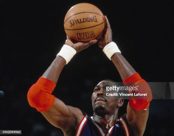 Hakeem Olajuwon, Center for the Houston Rockets prepares to make a free throw shot during Game 4 of the NBA Western Conference Playoff basketball...