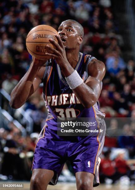 Clifford Robinson , Power Forward, Small Forward, and Center for the Phoenix Suns prepares to make a free throw shot during the NBA Pacific Division...