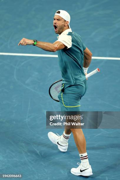 Grigor Dimitrov of Bulgaria celebrates match point in their round two singles match against Thanasi Kokkinakis of Australia during the 2024...