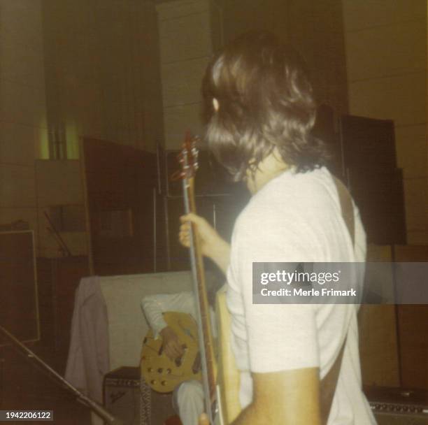 Paul McCartney's during The Beatles recording session for "Come Together" the Abbey Road Album at EMI Studios, July 23, 1969. John Lennon is seated. .