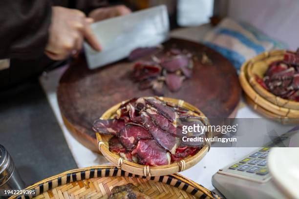 cutting beef jerky slices - beef jerky stock pictures, royalty-free photos & images