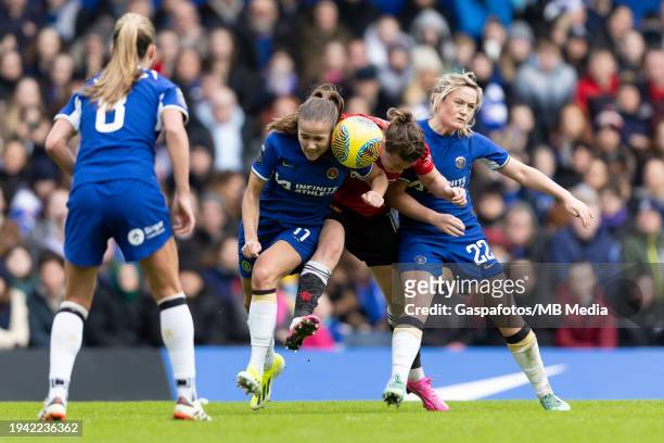 Guro Reiten of Chelsea, Hayley Ladd of Manchester United and Erin Cuthbert of Chelsea compete for the ball during the Barclays Women's Super League...
