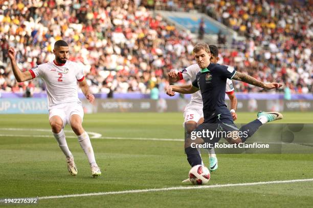 Riley McGree of Australia shoots during the AFC Asian Cup Group B match between Syria and Australia at Jassim Bin Hamad Stadium on January 18, 2024...