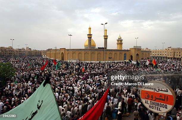 Thousands of Muslim Shias gather together in front of the Abbas Mosque during the annual pilgrimage, which had been banned by Saddam Hussein for the...