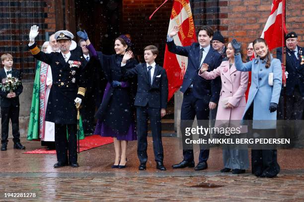 King Frederik X and Queen Mary of Denmark wave to onlookers as they arrive with their children Crown Prince Christian , Princess Isabella , Princess...