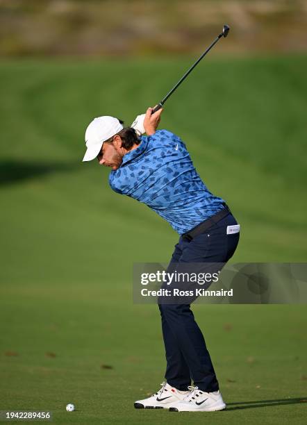 Tommy Fleetwood of England plays his second shot on the 14th hole on day one of the Hero Dubai Desert Classic at Emirates Golf Club on January 18,...