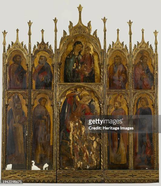Madonna and Child with St. Michael and Other Saints, circa 1440. This monumental and intact polyptych , which is now unfortunately badly damaged, is...