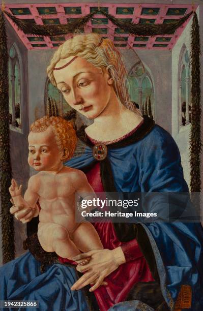 Virgin and Child, circa 1460. Tthe Virgin and Child are placed in a box-like room lined with gothic windows and a coffered ceiling. A decorative...