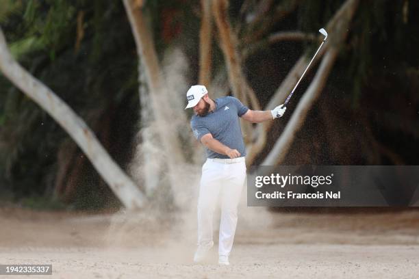 Tyrrell Hatton of England reacts on the 16th hole during Round One of the Hero Dubai Desert Classic at Emirates Golf Club on January 18, 2024 in...