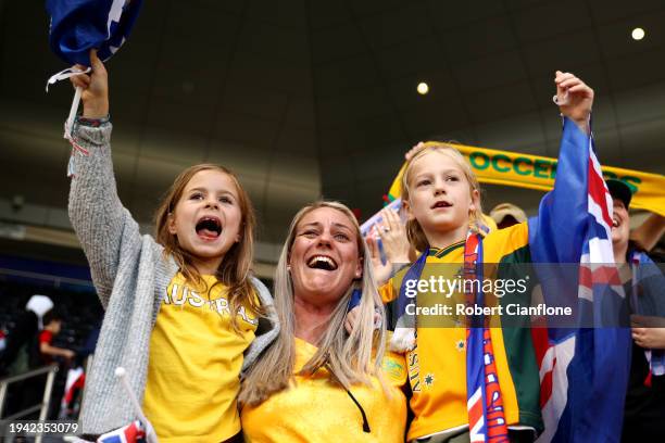 Fans of Australia celebrate after the team's victory in the AFC Asian Cup Group B match between Syria and Australia at Jassim Bin Hamad Stadium on...