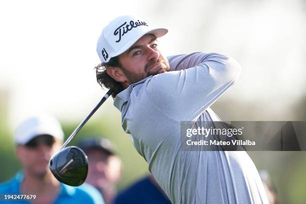 Cameron Young of United States tees off on the 12th hole on day one of the Hero Dubai Desert Classic at Emirates Golf Club on January 18, 2024 in...